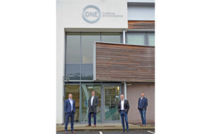 Directors with the new branding outside Worcester HQ