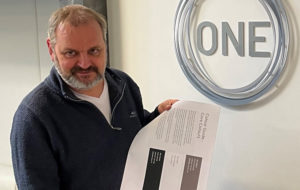 Mark Martin with branding document